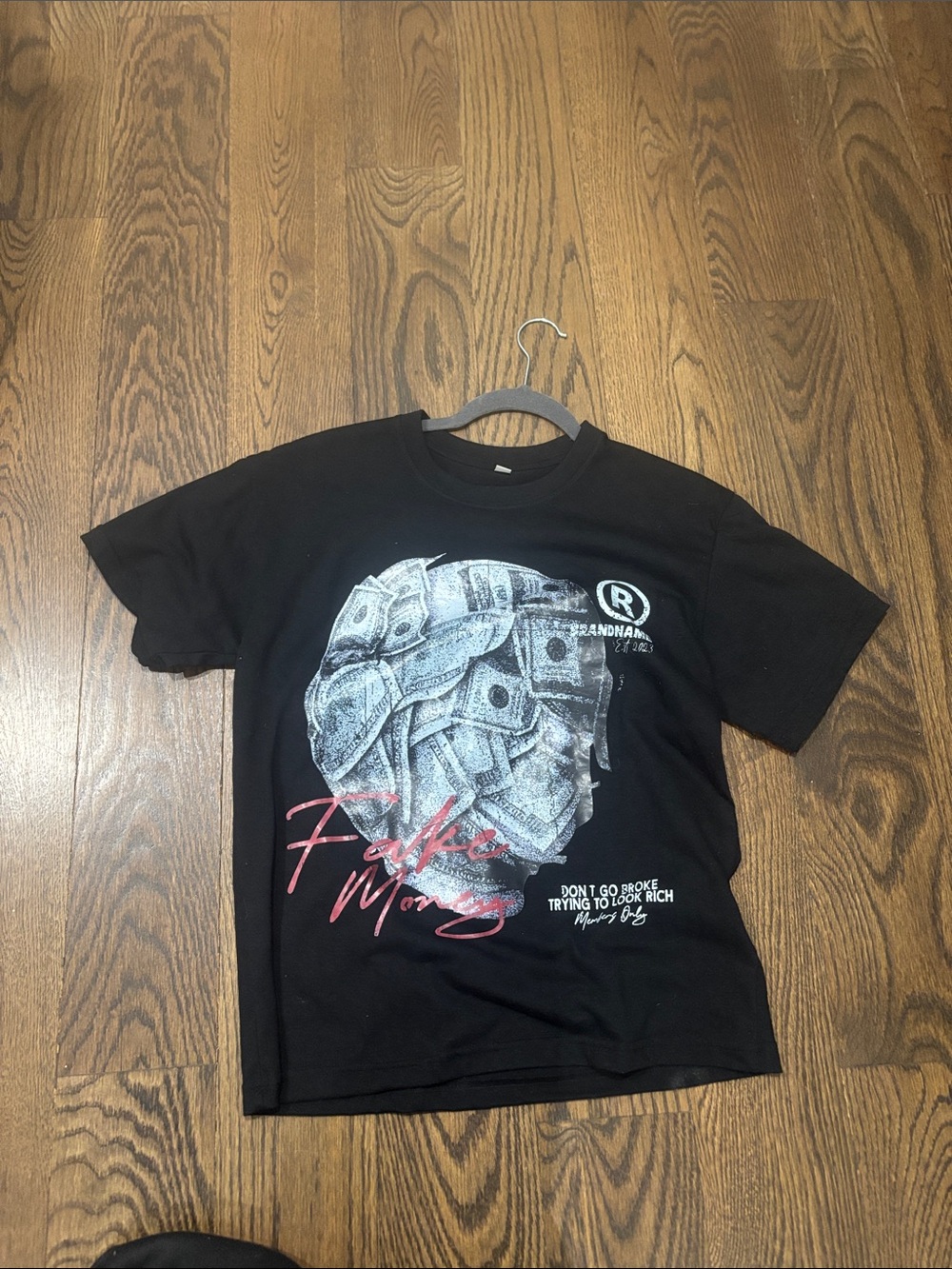 Black Graphic Tee with Money Helmet Print